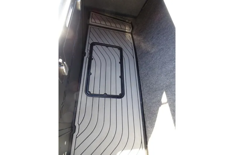Slide: The Image of 2024 Nautique Super Air Nautique G23 interior flooring with sleek, modern design. - 36