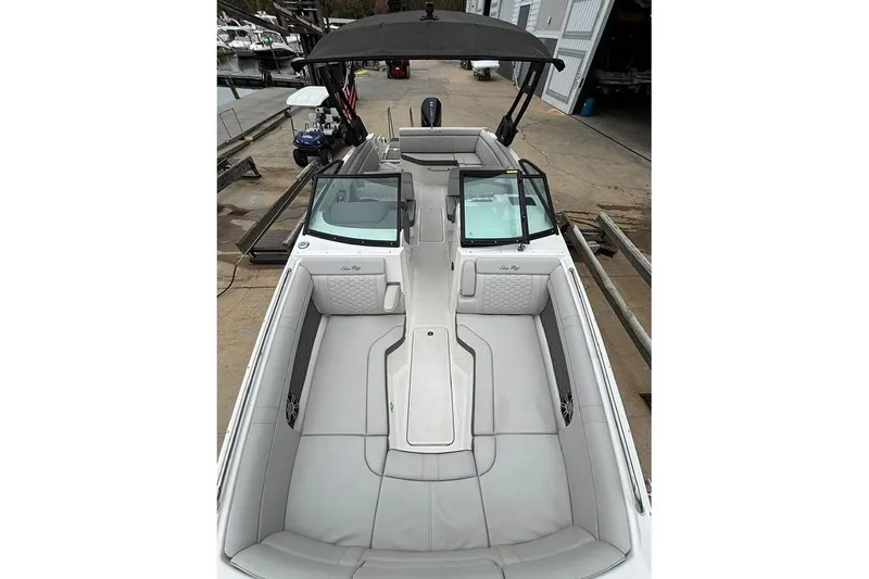 Slide: The Image of 2023 Sea Ray SDX 270 Outboard boat with spacious seating and sleek design. - 22