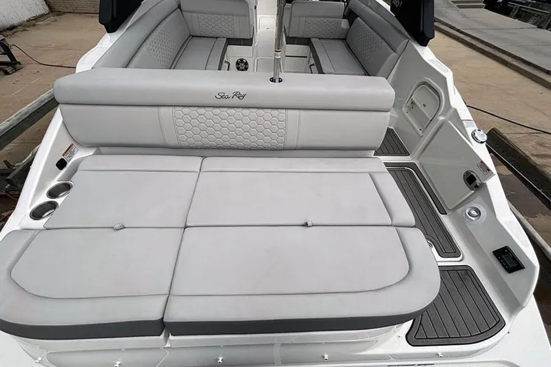 Slide: The Image of 2023 Sea Ray SDX 270 Outboard boat interior with spacious seating and modern design. - 7