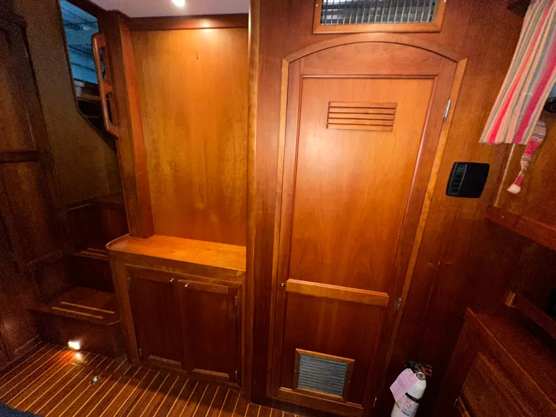 Slide: The Image of Interior of 2001 Sabreline 43 yacht with wooden cabinetry and flooring. - 45