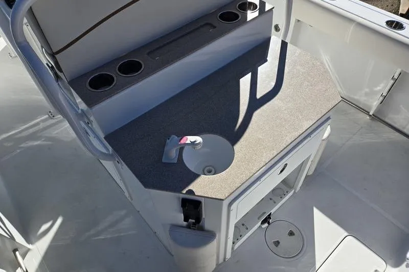Slide: The Image of Interior view of 2026 Sea Hunt Ultra 275 SE boat with sink and storage. - 15
