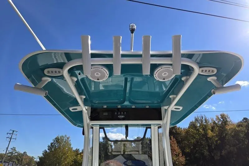 Slide: The Image of 2026 Sea Hunt Ultra 275 SE boat top view with rod holders and speakers. - 18