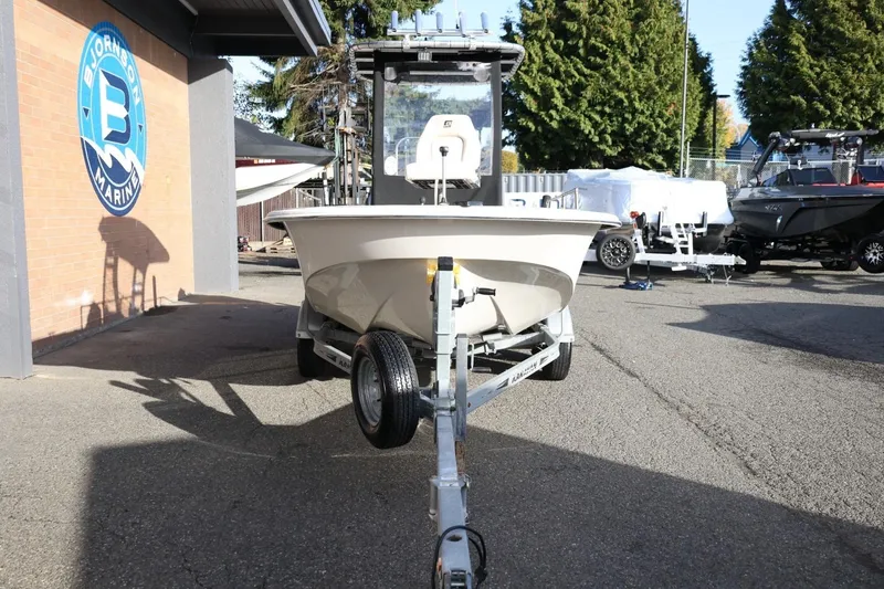 Slide: The Image of 2013 Carolina Skiff 178 DLV boat on trailer at Bjornson Marine dealership. - 11