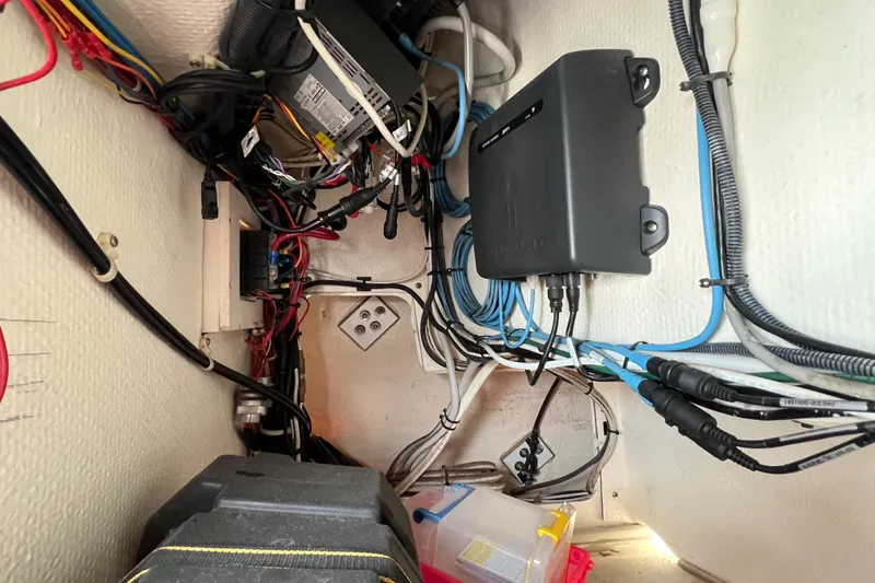 Slide: The Image of Electrical wiring and components inside a 2004 Henriques 35 Sportfisherman boat. - 119