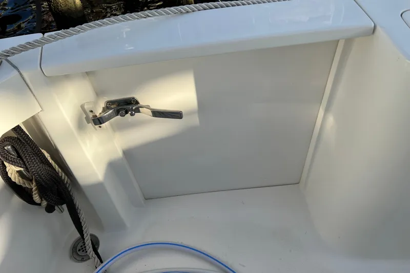 Slide: The Image of 2004 Henriques 35 Sportfisherman boat deck with cleat and rope detail. - 17