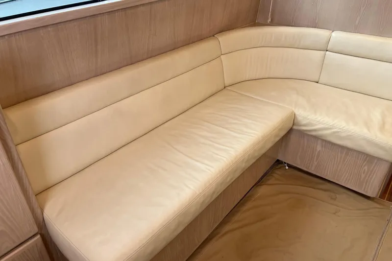 Slide: The Image of Cream leather seating in 2004 Henriques 35 Sportfisherman boat interior. - 43