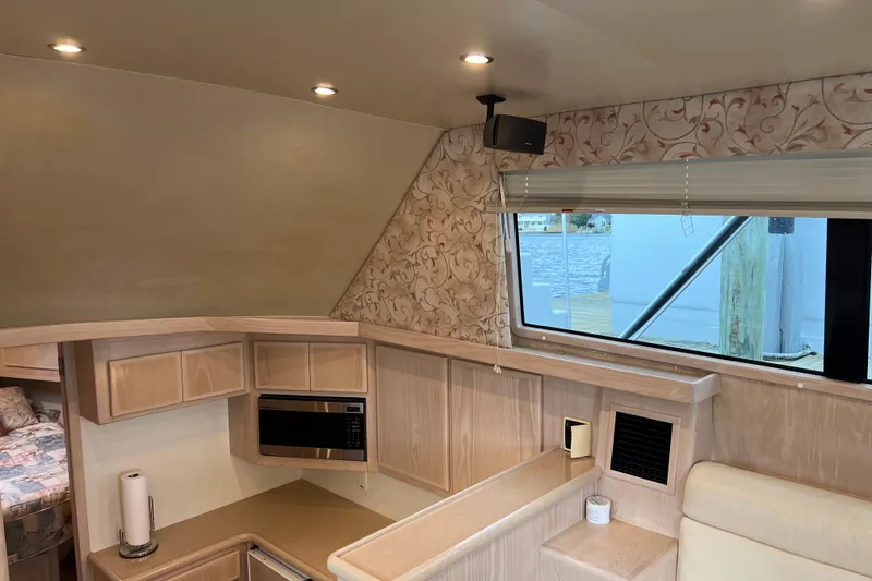 Slide: The Image of Interior of 2004 Henriques 35 Sportfisherman with modern kitchen and window view. - 46