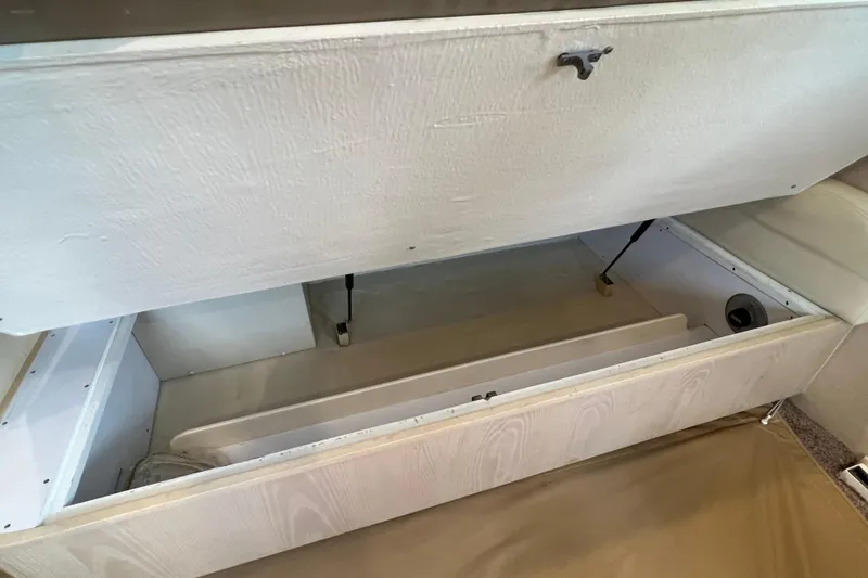 Slide: The Image of Open storage compartment in 2004 Henriques 35 Sportfisherman boat interior. - 50