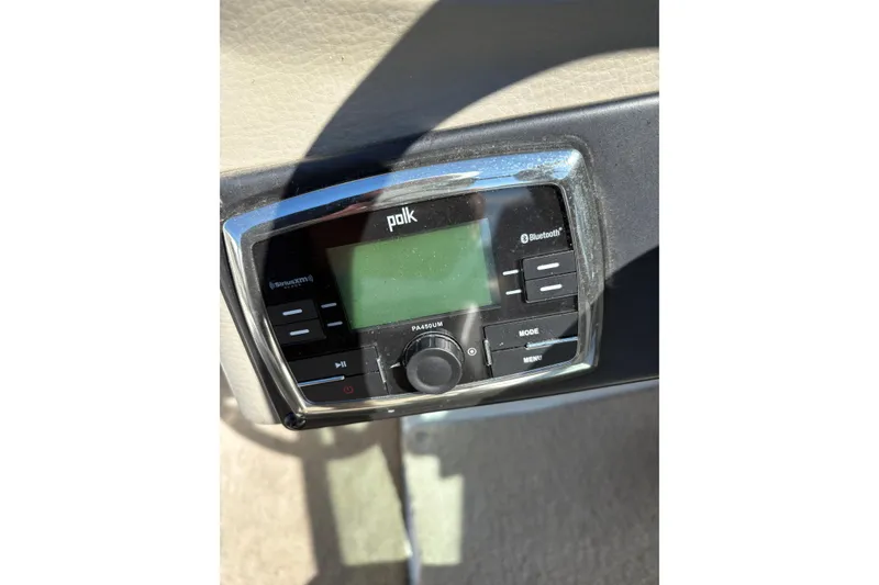 Slide: The Image of Polk audio system in 2014 Crownline Eclipse E2 XS boat, featuring Bluetooth connectivity. - 10