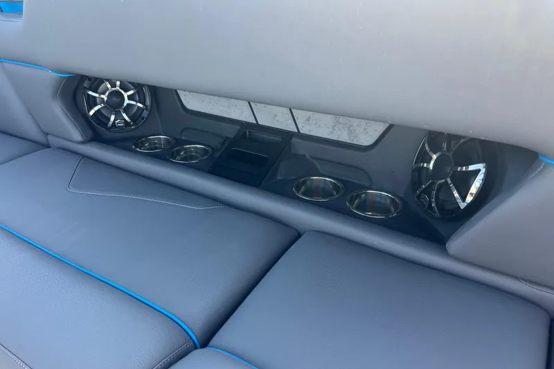 Slide: The Image of Control panel of 2022 Moomba Kaiyen boat with stereo and ignition system. - 34