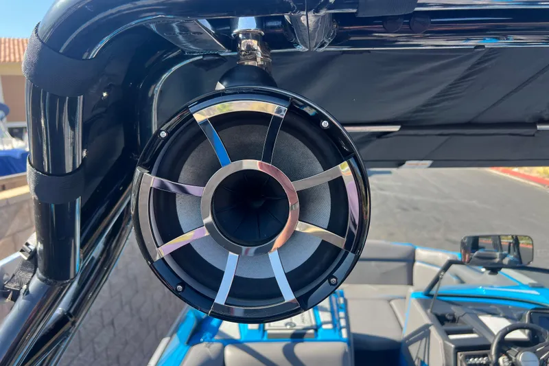 Slide: The Image of 2022 Moomba Kaiyen interior with cup holders and speakers, showcasing modern design features. - 38