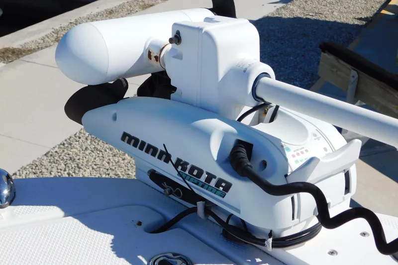 Slide: The Image of Minn Kota trolling motor on 2014 Robalo R207 Dual Console boat. - 23