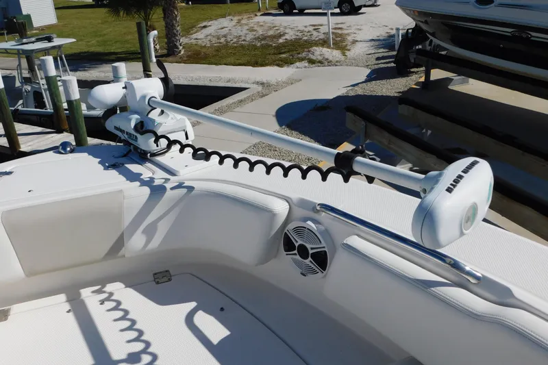 Slide: The Image of 2014 Robalo R207 Dual Console boat with trolling motor and speaker on deck. - 25