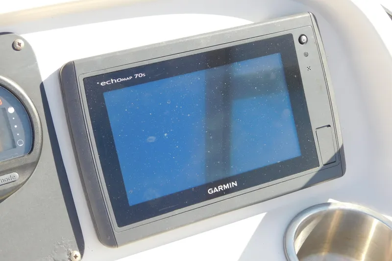 Slide: The Image of Garmin echoMAP 70s on 2014 Robalo R207 Dual Console boat dashboard. - 26