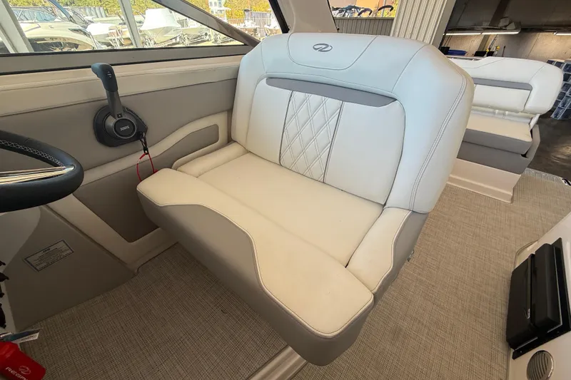 Slide: The Image of 2026 Regal 28 Express boat interior with luxurious white seating and modern design. - 23