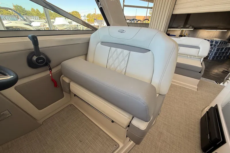 Slide: The Image of 2026 Regal 28 Express boat interior with luxurious seating and modern design. - 24