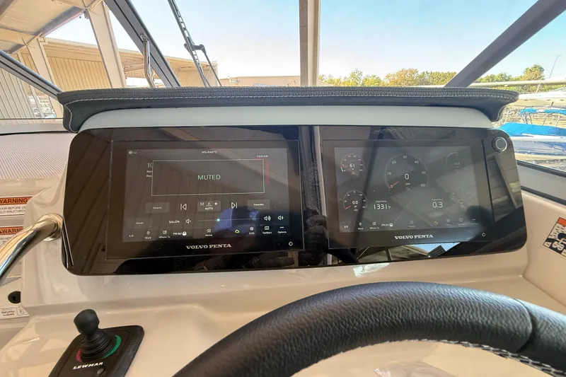 Slide: The Image of Dashboard of 2026 Regal 28 Express boat with dual Volvo Penta displays. - 30