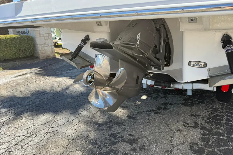 Slide: The Image of 2026 Regal 28 Express boat propeller and stern drive on a trailer. - 5