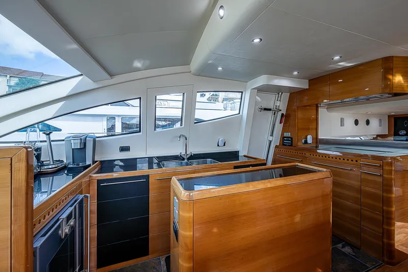 Slide: The Image of Luxurious interior of a 2009 Aicon 64 yacht with modern kitchen design. - 5