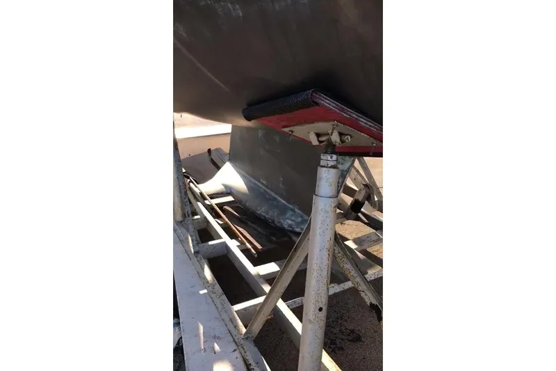 Slide: The Image of 1989 Hunter 30 sailboat hull on a support stand, viewed from below. - 28