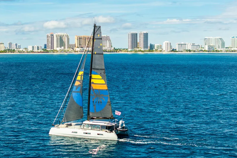 Slide: The Image of Sailing yacht Harvey Yachts 58, 2017 model, cruising near a city skyline. - 10