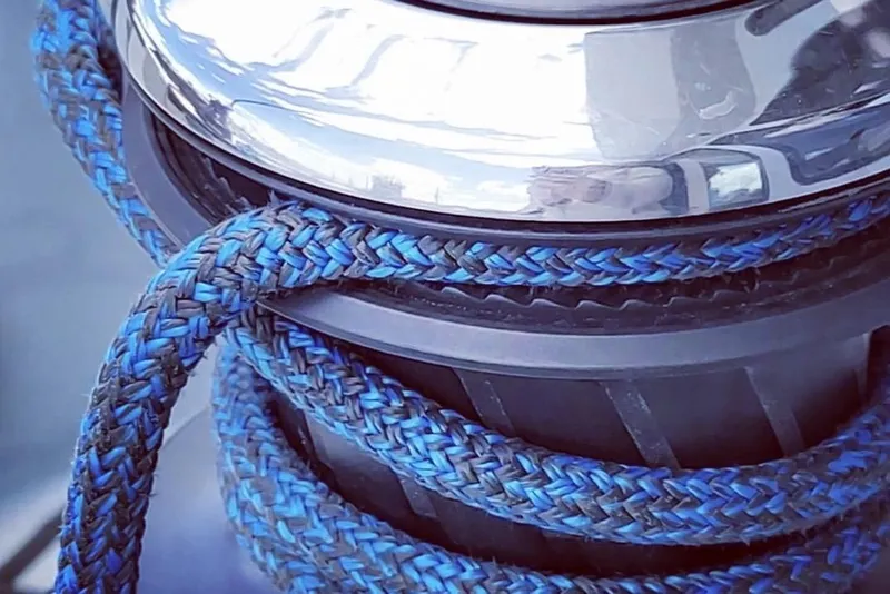 Slide: The Image of Close-up of a winch with blue rope on a 2017 Harvey Yachts 58. - 113