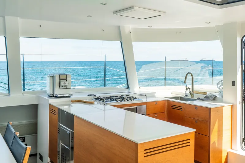 Slide: The Image of Luxurious kitchen interior on 2017 Harvey Yachts 58, featuring ocean views and modern amenities. - 23