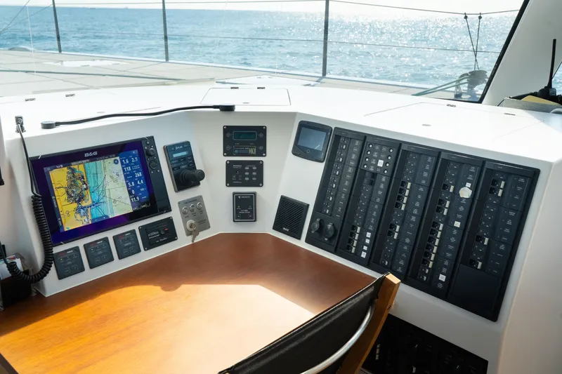 Slide: The Image of Control panel of a 2017 Harvey Yachts 58, featuring navigation and communication systems. - 25