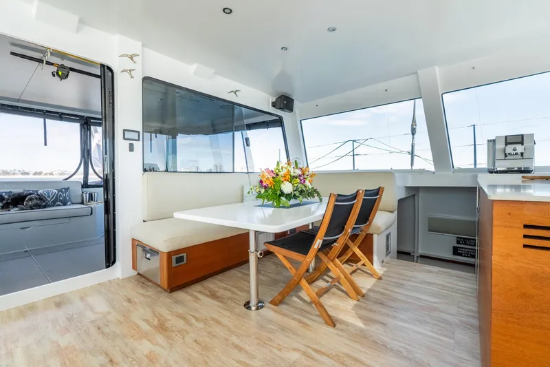 Slide: The Image of Luxurious interior of 2017 Harvey Yachts 58, featuring elegant seating and a dining area. - 29