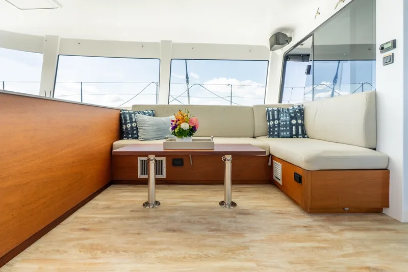 Slide: The Image of Luxurious interior of 2017 Harvey Yachts 58, featuring elegant seating and a stylish table. - 32