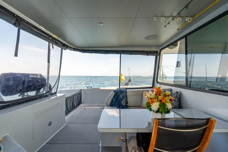 Slide: The Image of Luxurious interior of 2017 Harvey Yachts 58 with ocean view and floral centerpiece. - 33