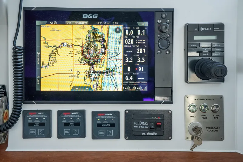 Slide: The Image of Control panel of a 2017 Harvey Yachts 58 with navigation and monitoring systems. - 36
