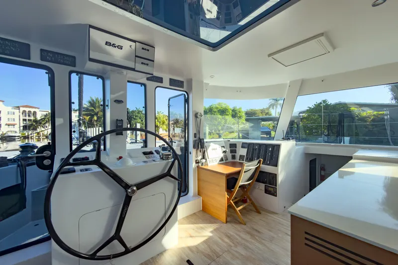 Slide: The Image of Pilothouse interior of 2017 Harvey Yachts 58, featuring helm and navigation equipment. - 42