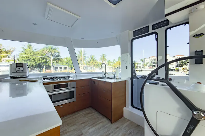 Slide: The Image of Luxurious interior of 2017 Harvey Yachts 58, featuring modern kitchen and steering area. - 43