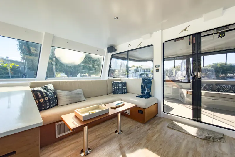 Slide: The Image of Luxurious interior of 2017 Harvey Yachts 58, featuring elegant seating and panoramic windows. - 46