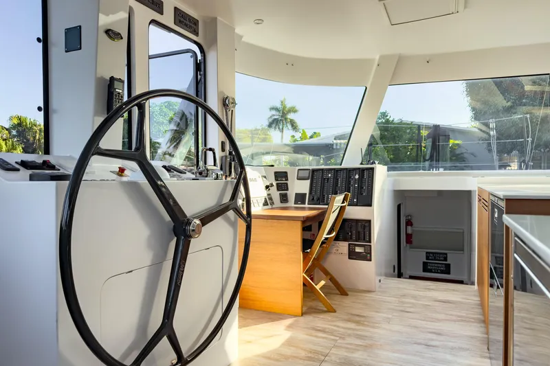 Slide: The Image of Interior of 2017 Harvey Yachts 58, featuring helm and navigation controls. - 47