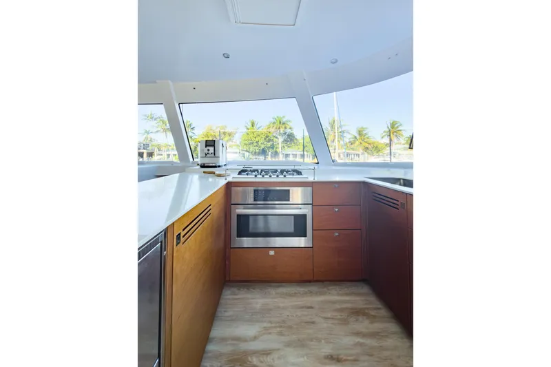 Slide: The Image of Modern kitchen interior on 2017 Harvey Yachts 58, featuring sleek appliances and ocean view. - 49