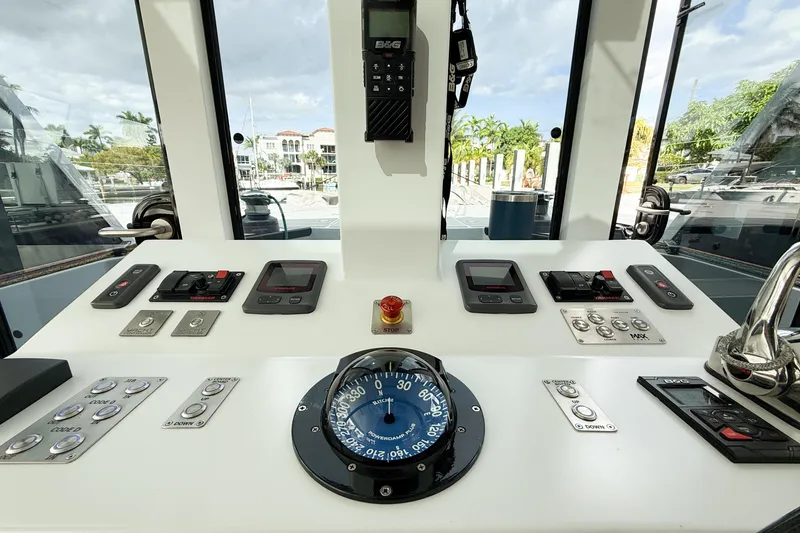 Slide: The Image of Control panel of 2017 Harvey Yachts 58, featuring navigation and communication equipment. - 55
