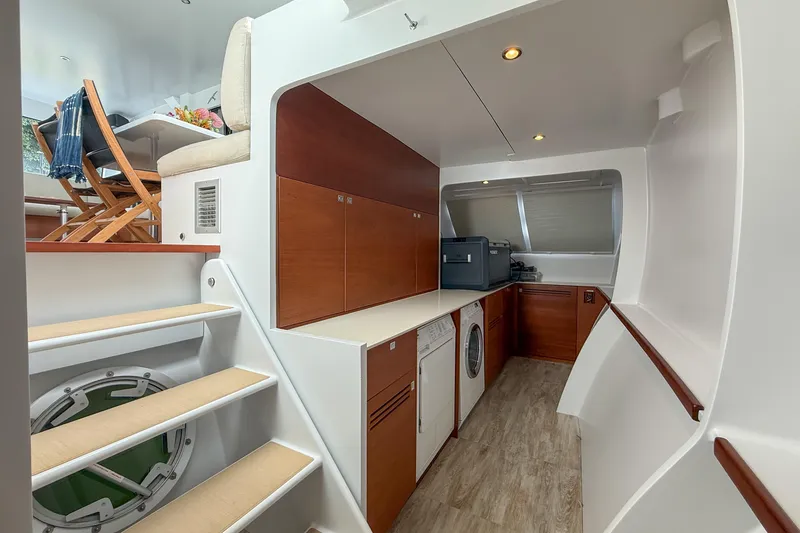 Slide: The Image of Luxurious interior of 2017 Harvey Yachts 58, featuring modern kitchen and dining area. - 56