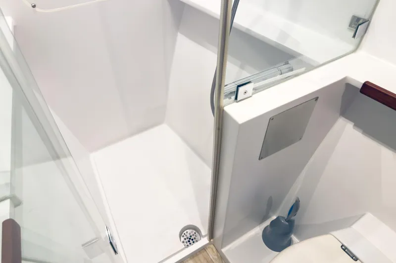 Slide: The Image of Modern shower area in 2017 Harvey Yachts 58, featuring sleek design and glass door. - 63