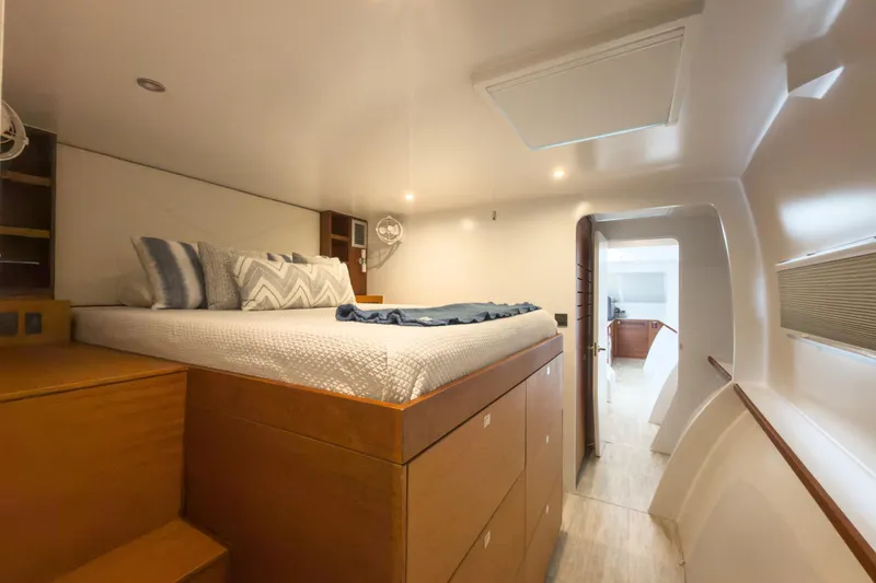 Slide: The Image of Luxurious cabin interior of 2017 Harvey Yachts 58, featuring a cozy bed and modern design. - 65