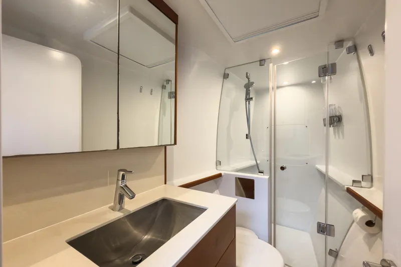Slide: The Image of Luxurious bathroom in 2017 Harvey Yachts 58, featuring modern fixtures and glass shower. - 67