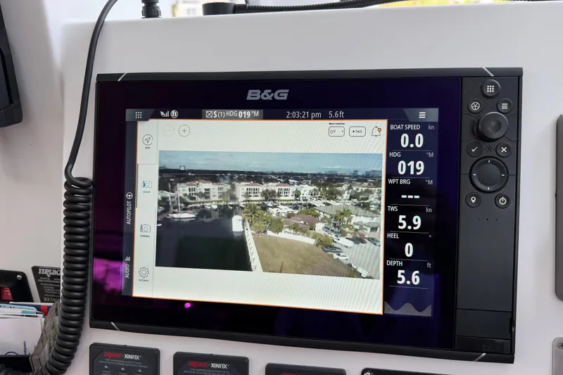 Slide: The Image of B&G navigation display on 2017 Harvey Yachts 58, showing marina view and boat metrics. - 73