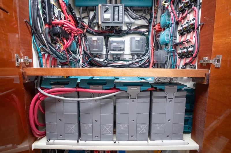 Slide: The Image of Electrical system of a 2017 Harvey Yachts 58, showcasing batteries and wiring. - 76