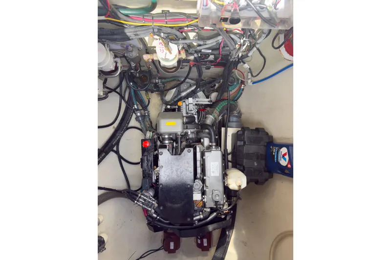 Slide: The Image of Engine compartment of a 2017 Harvey Yachts 58, showcasing intricate wiring and components. - 78