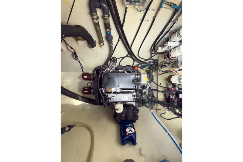 Slide: The Image of Engine room of 2017 Harvey Yachts 58, showcasing complex wiring and components. - 83