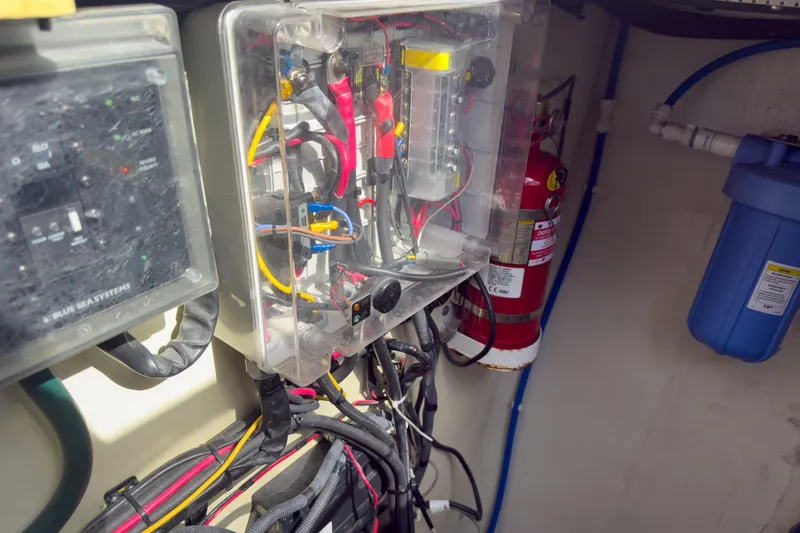 Slide: The Image of Electrical panel and fire extinguisher in 2017 Harvey Yachts 58 engine room. - 87