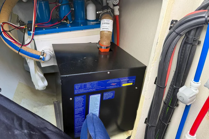 Slide: The Image of Engine room of 2017 Harvey Yachts 58 with electrical components and wiring. - 96