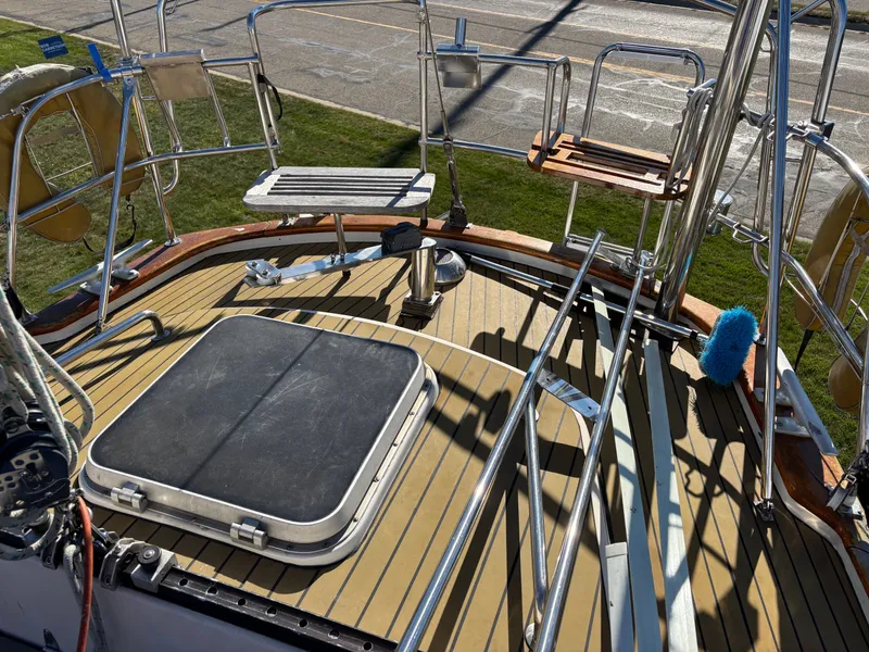 Slide: The Image of Deck of a 1979 Hallberg-Rassy 38 sailboat with stainless steel fittings. - 46
