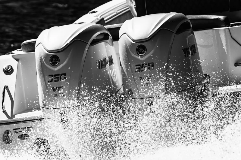 Slide: The Image of Twin Yamaha 350 V6 engines powering a 2026 Sea Hunt Ultra 305 Coffin Box boat. - 30